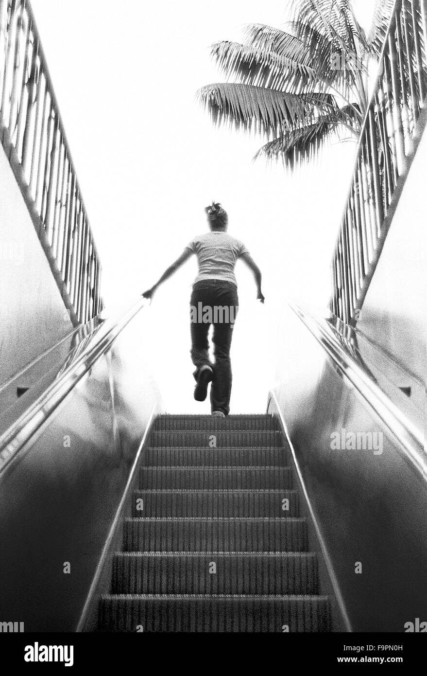 Climbing stairs woman Black and White Stock Photos & Images Alamy