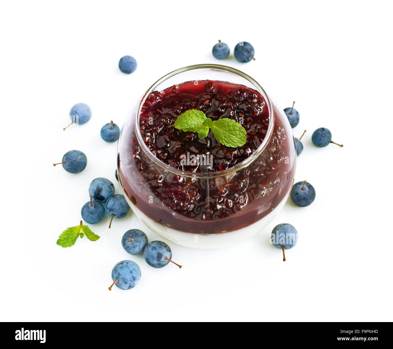 Panna cotta with blackthorn isolated on white background Stock Photo