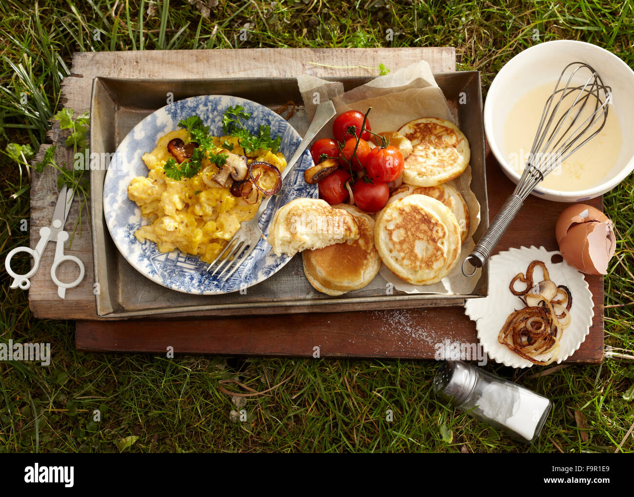 Scrambled eggs with buttermilk pancakes Stock Photo Alamy