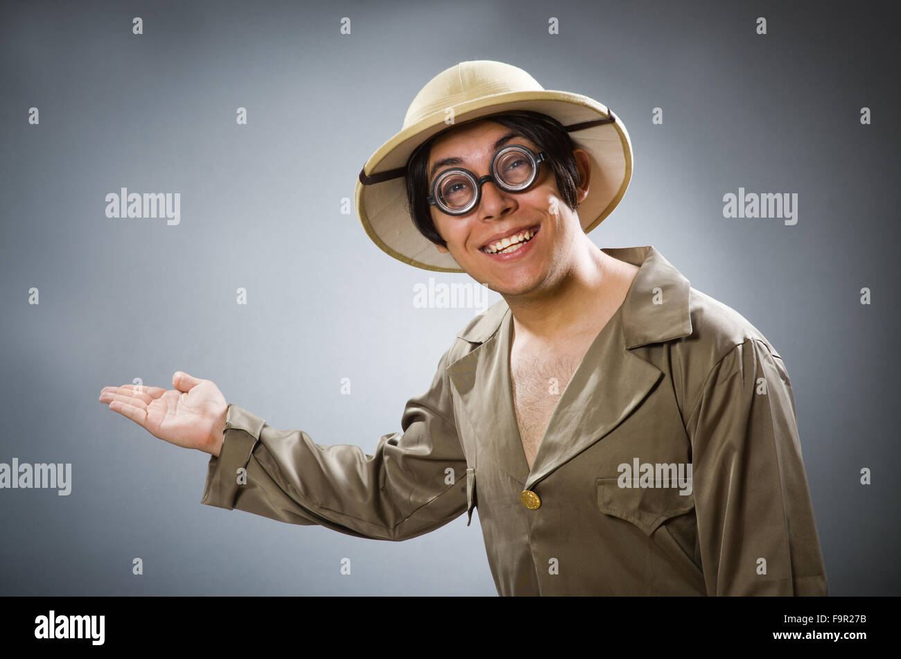 Man wearing safari hat in funny concept Stock Photo - Alamy