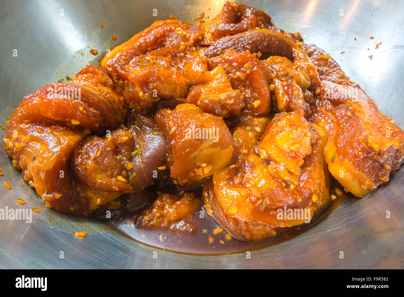 bbq red pork marinate with red sauce Stock Photo