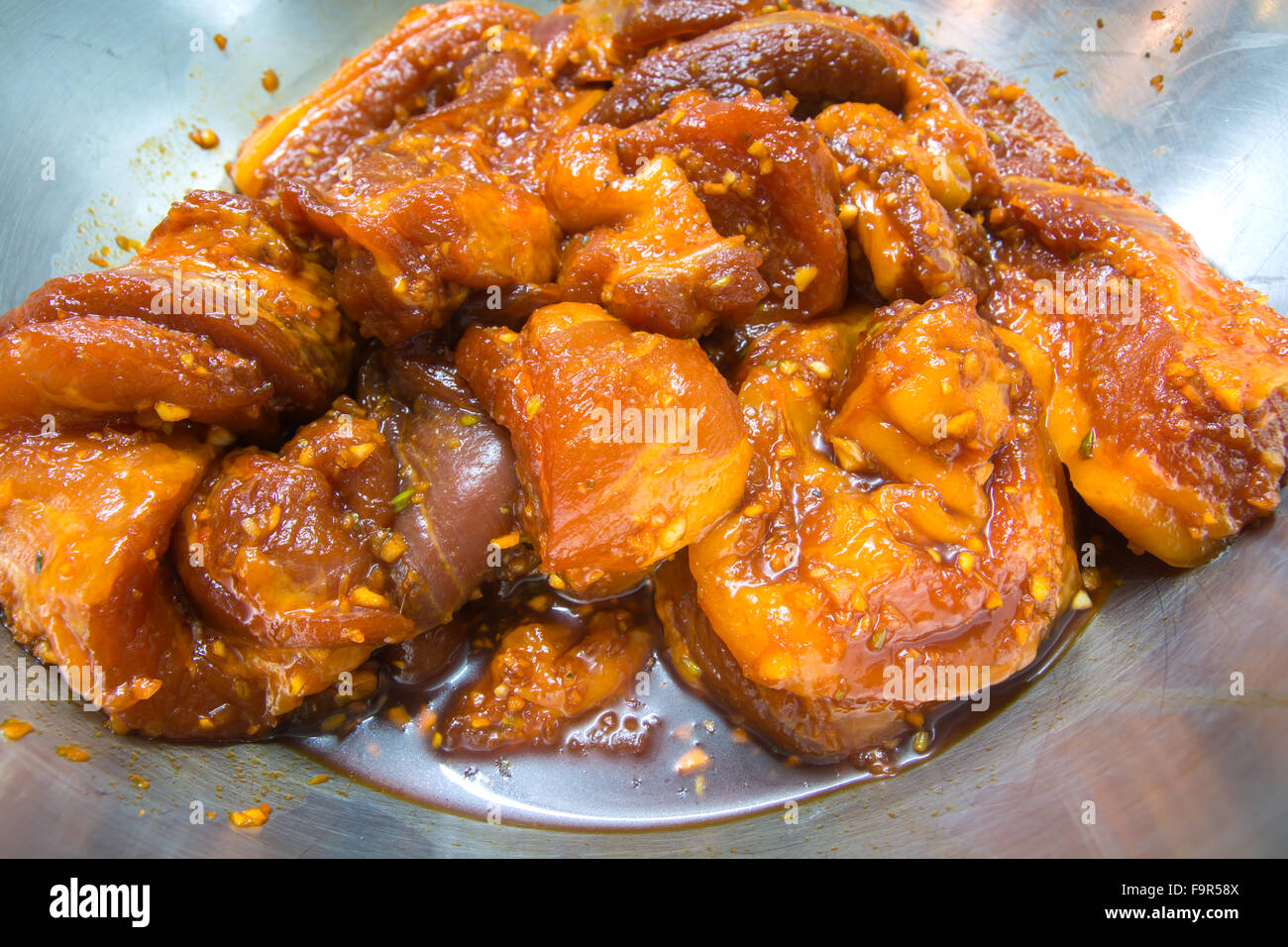 bbq red pork marinate with red sauce Stock Photo