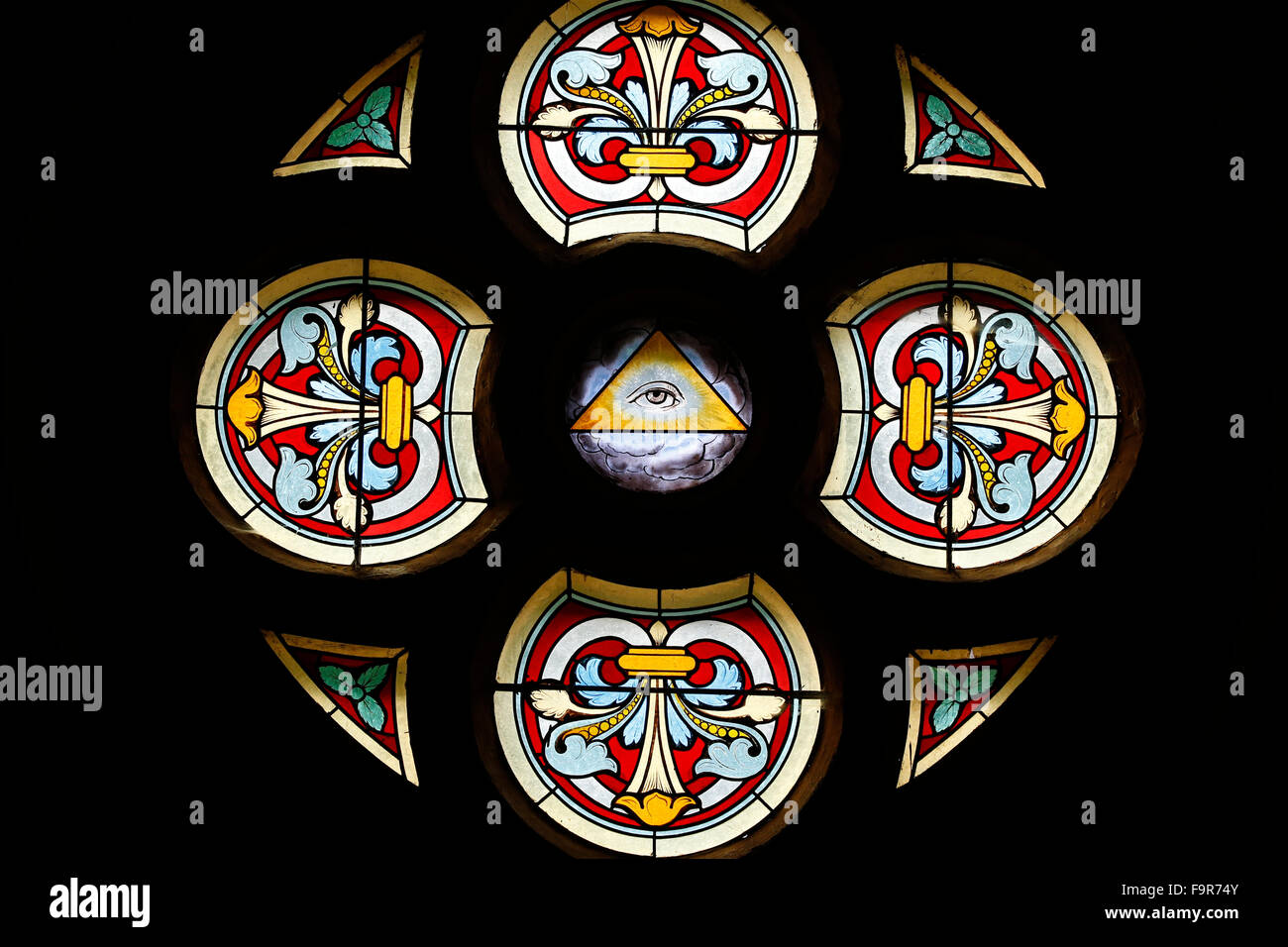 Saint Antoine church. Stained glass window. The eye of God Stock Photo ...