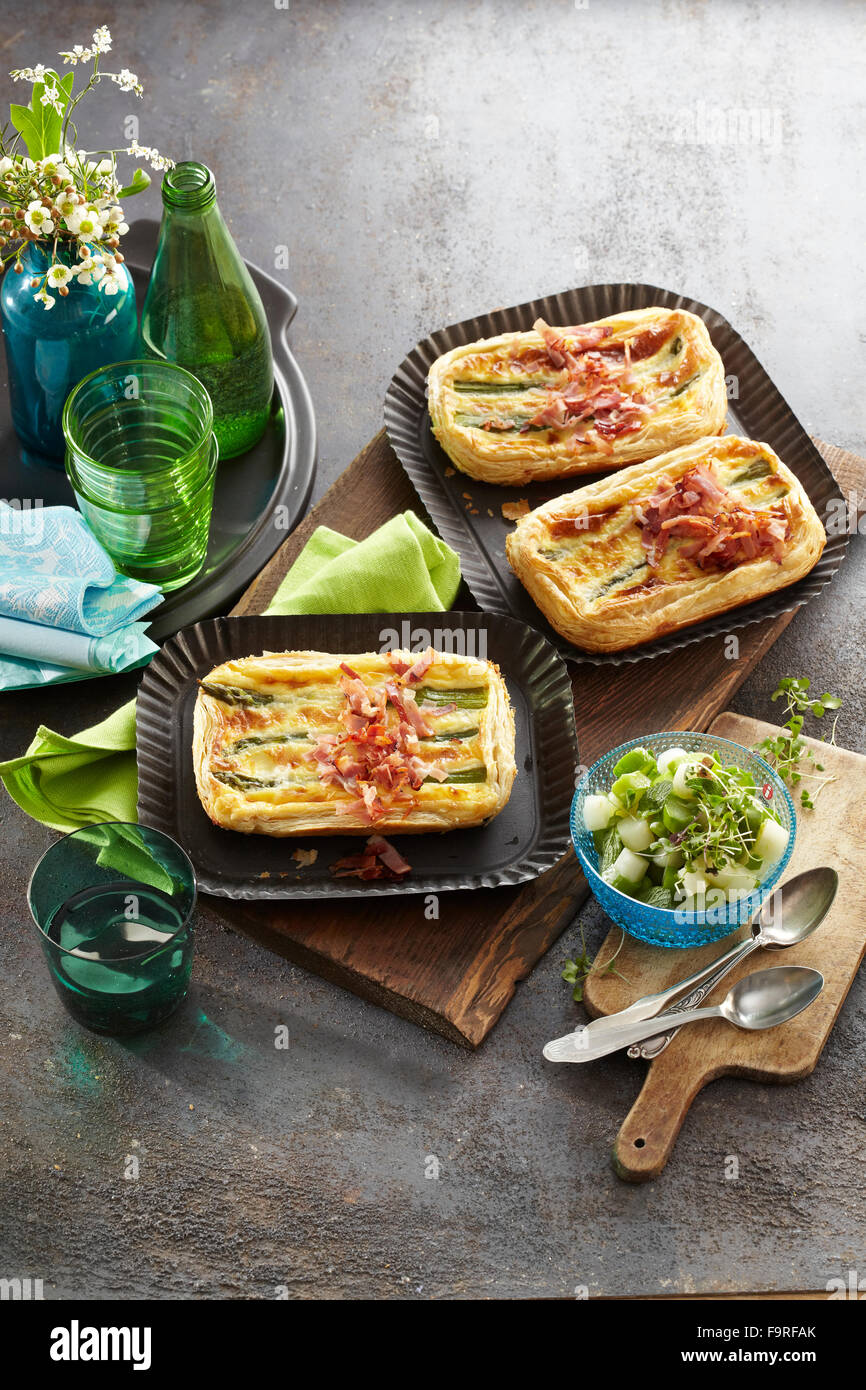 Asparagus,, Parma ham and feta puff tarts Stock Photo Alamy