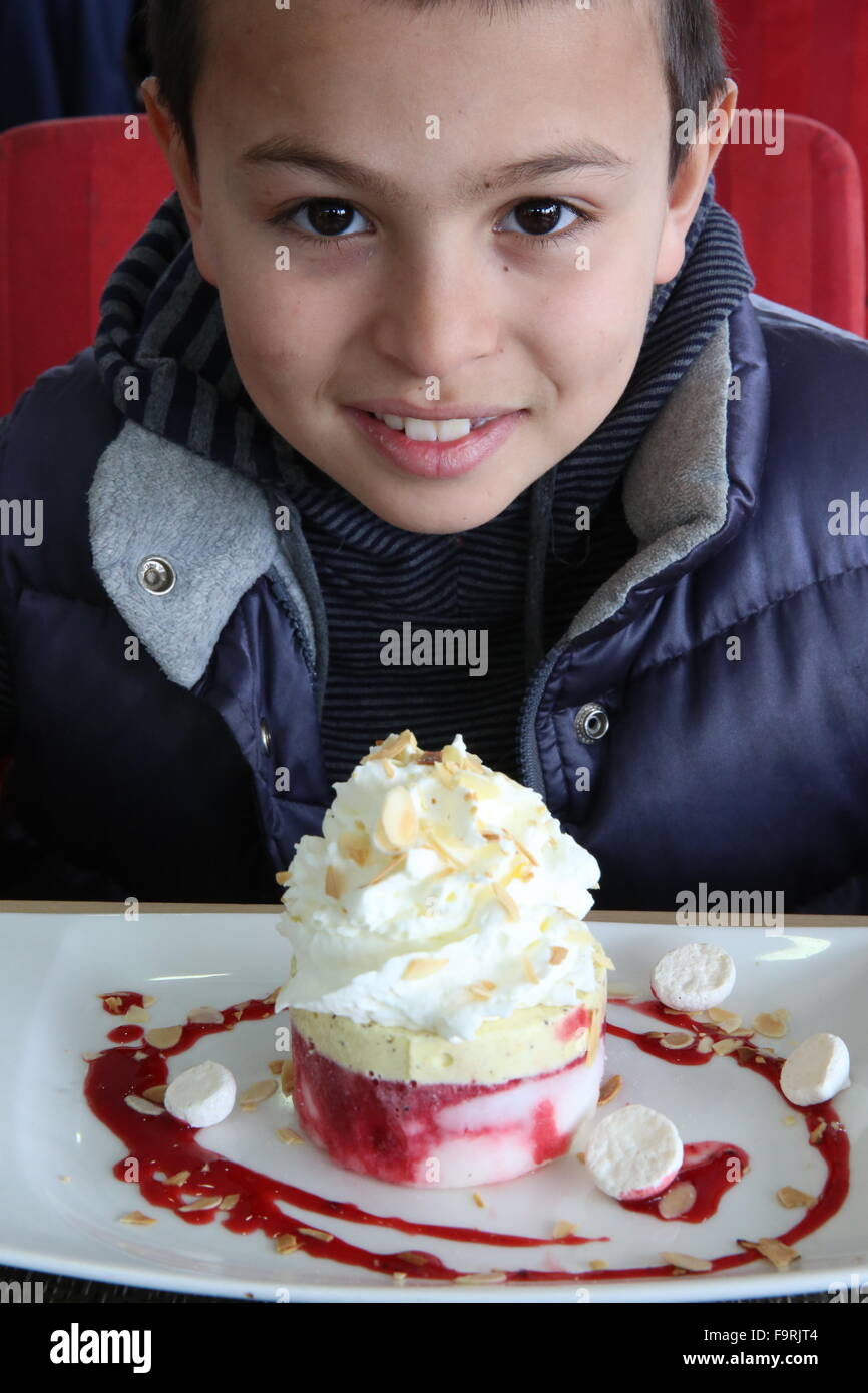 Boy about to eat dessert. Stock Photo