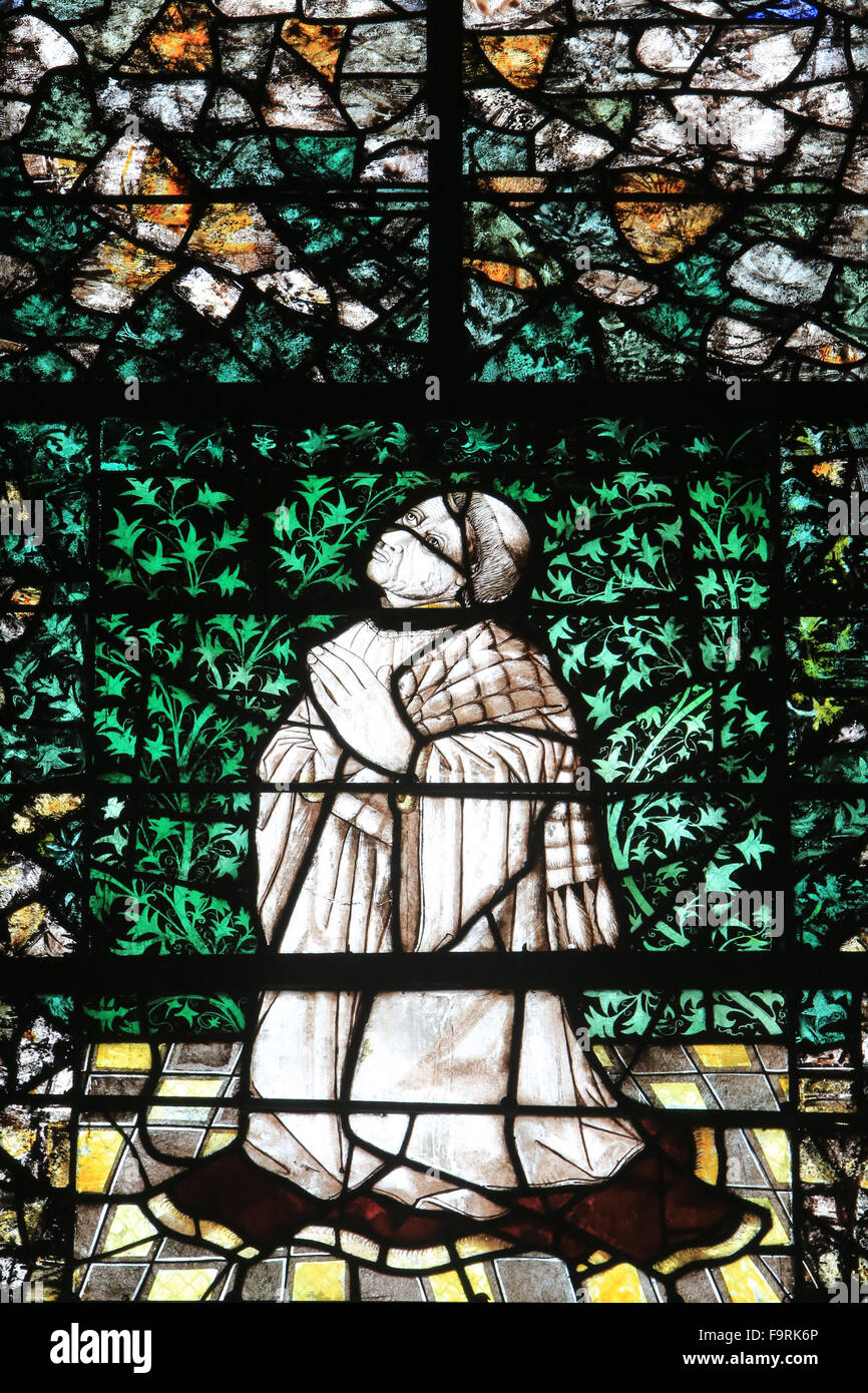 Canon donor. Detail of a modern stained glass Jeanette Weiss Gruber . Beauvais Cathedral. Stock Photo