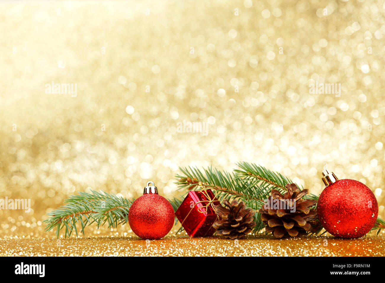 Christmas card with fir and decor on glitter background Stock Photo - Alamy