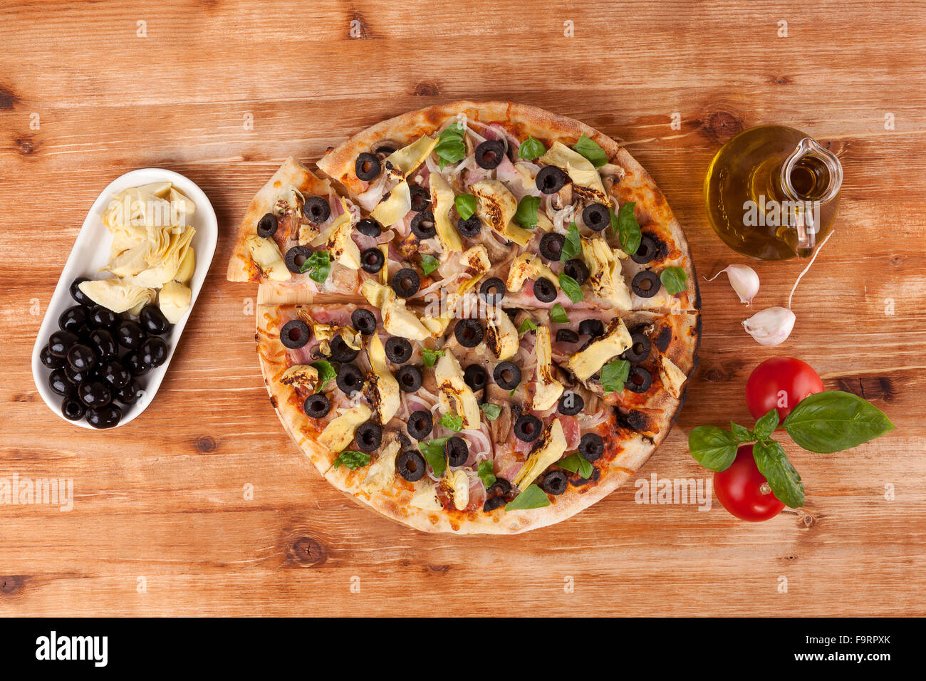 Pizza Eating Fresh Pizza And Fresh Pizza Ingredients On Wooden Table