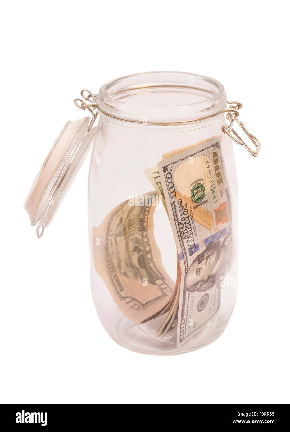 US dollar banknotes in jar on white background Stock Photo