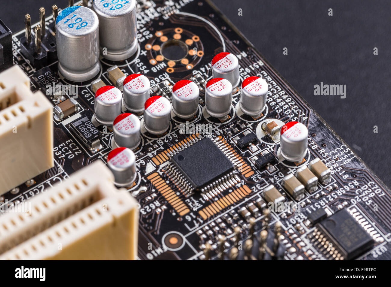 Microchips and condensers assembly on the circuit board Stock Photo