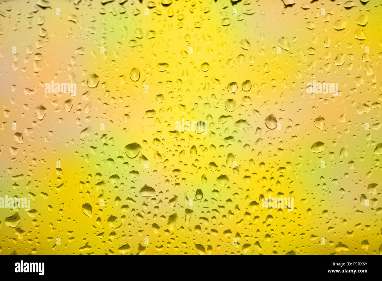 Glass surface with water drops in a rainy day Stock Photo - Alamy