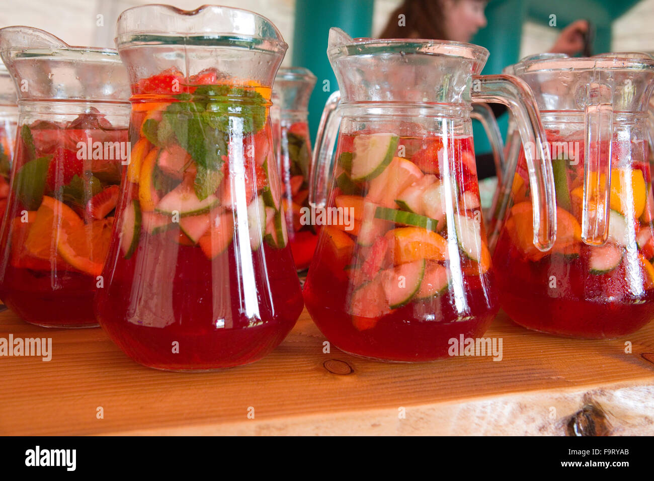 pimms and lemonade drink jug glass glasses refreshing fruit alcoholic drinks alcohol fresh mint gin based tall long cocktail coc Stock Photo