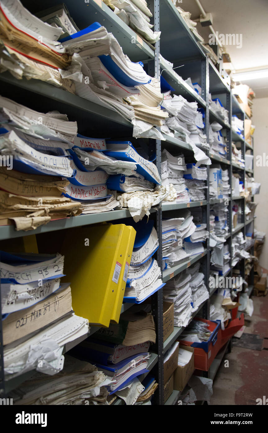 Document records archive featuring boxes and files of old documents