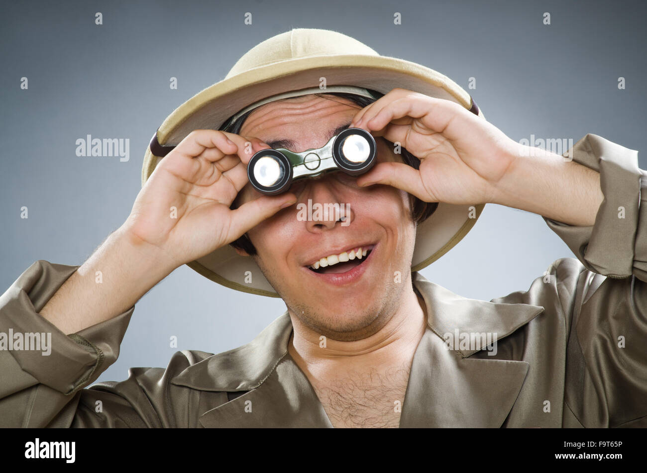 Man wearing safari hat in funny concept Stock Photo - Alamy