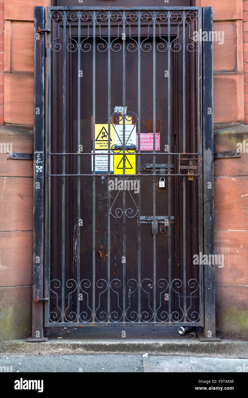 Locked gate at the entrance to an electricity substation, UK Stock Photo