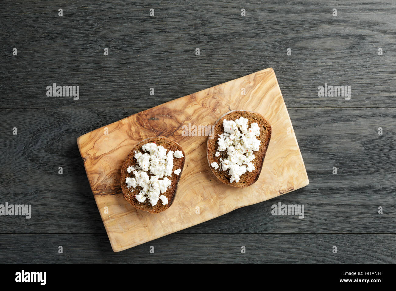 rye bread grated with garlic and ricotta cheese Stock Photo Alamy
