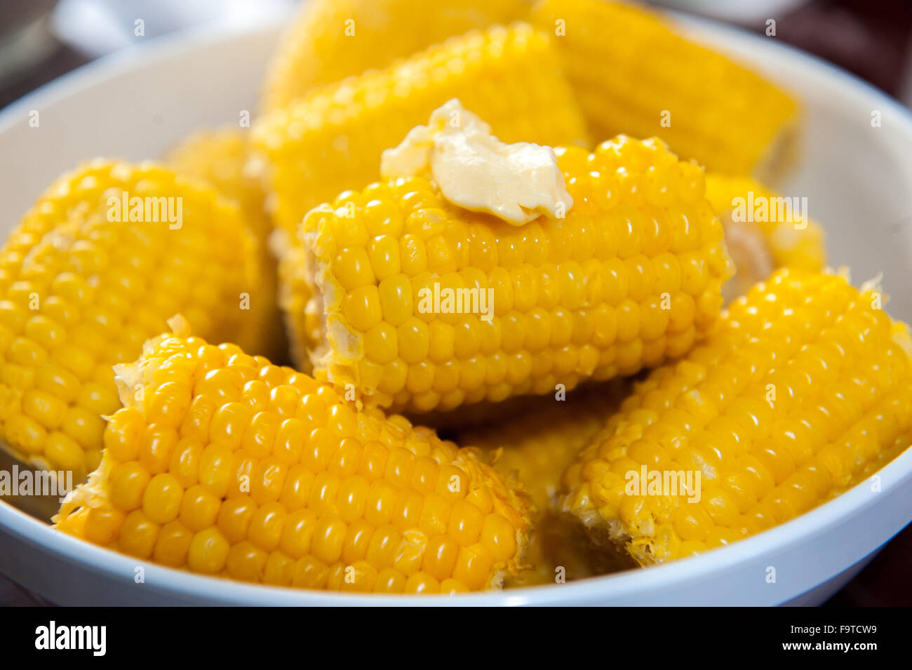 Bowl of cooked yellow corn with melting butter Stock Photo Alamy
