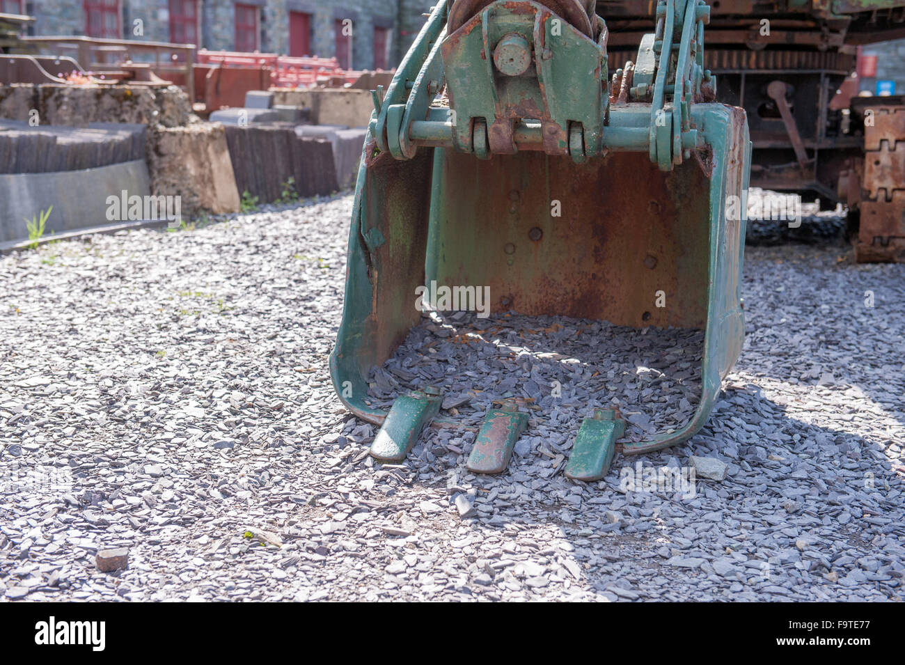 Large rusty digging bucket on big industrial digger Stock Photo