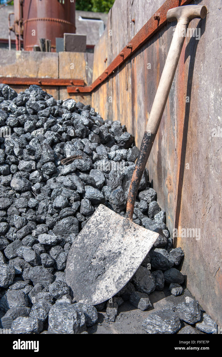 Large pile of coal stock and shoval Stock Photo