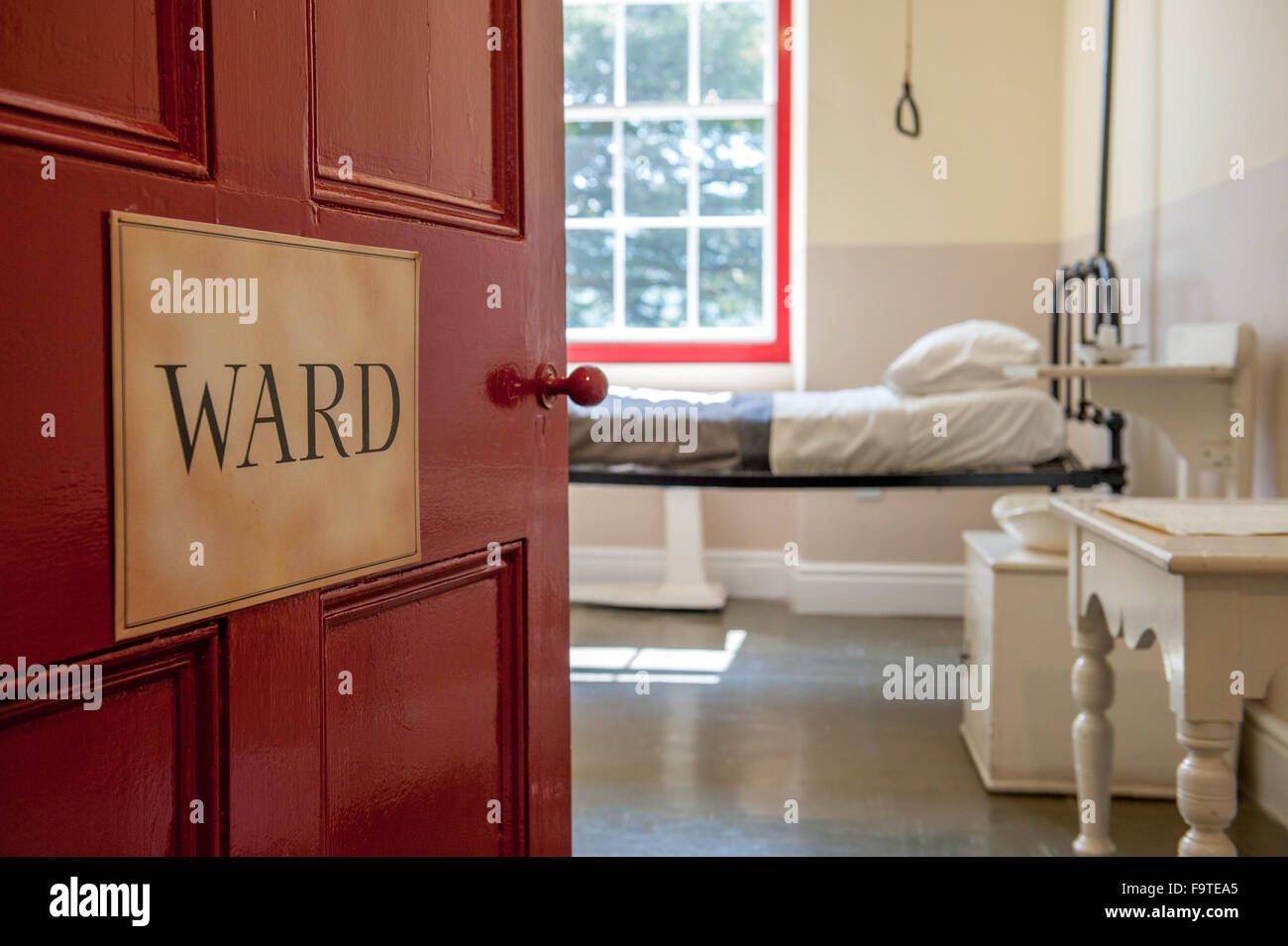 Open Door With Ward Sign Of Vintage Hospital Room Stock Photo