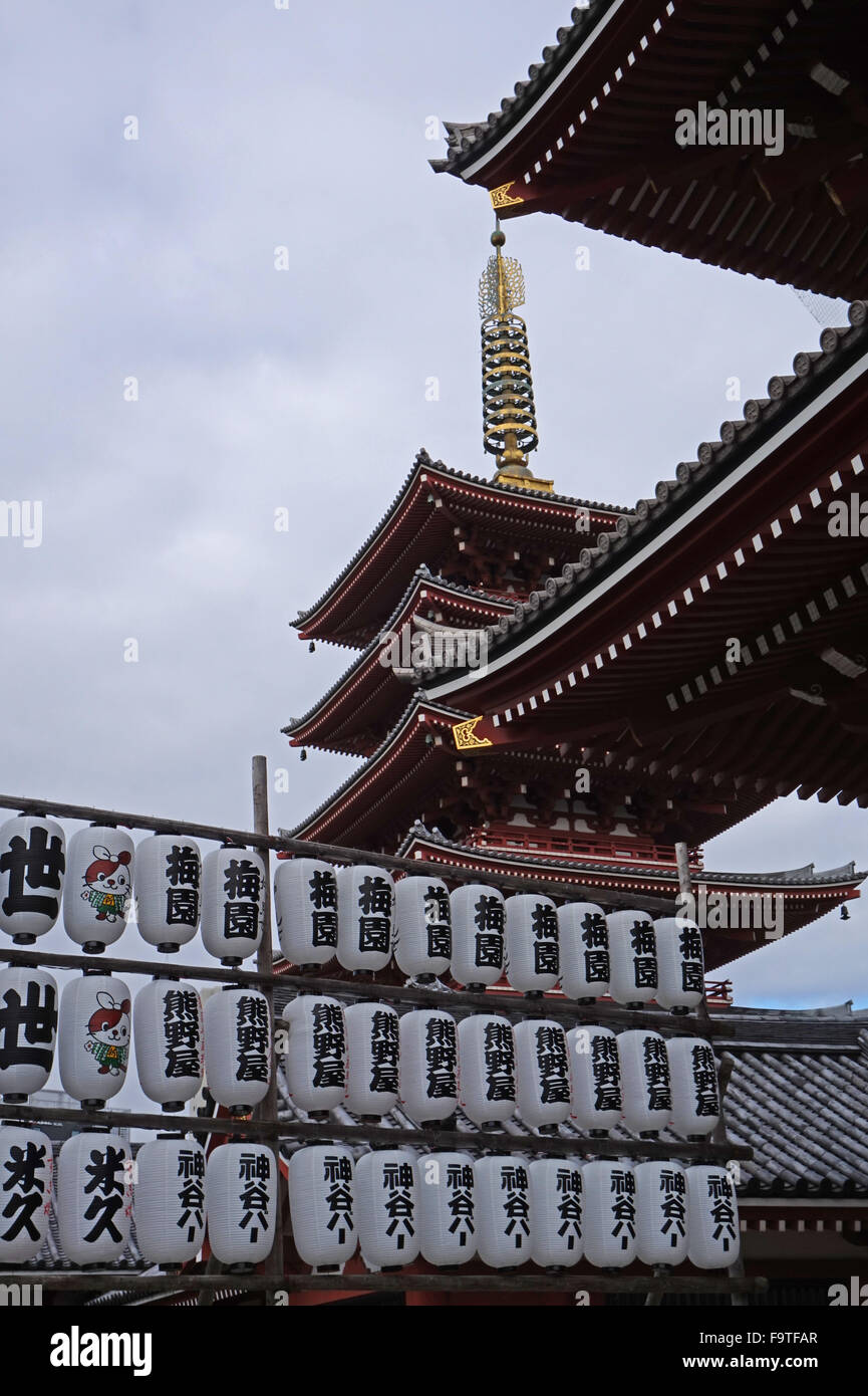 Paper lanterns a gate and the Five-storied pagoda at Senso-ji Buddhist Temple, Asakusa, Tokyo, Japan Stock Photo