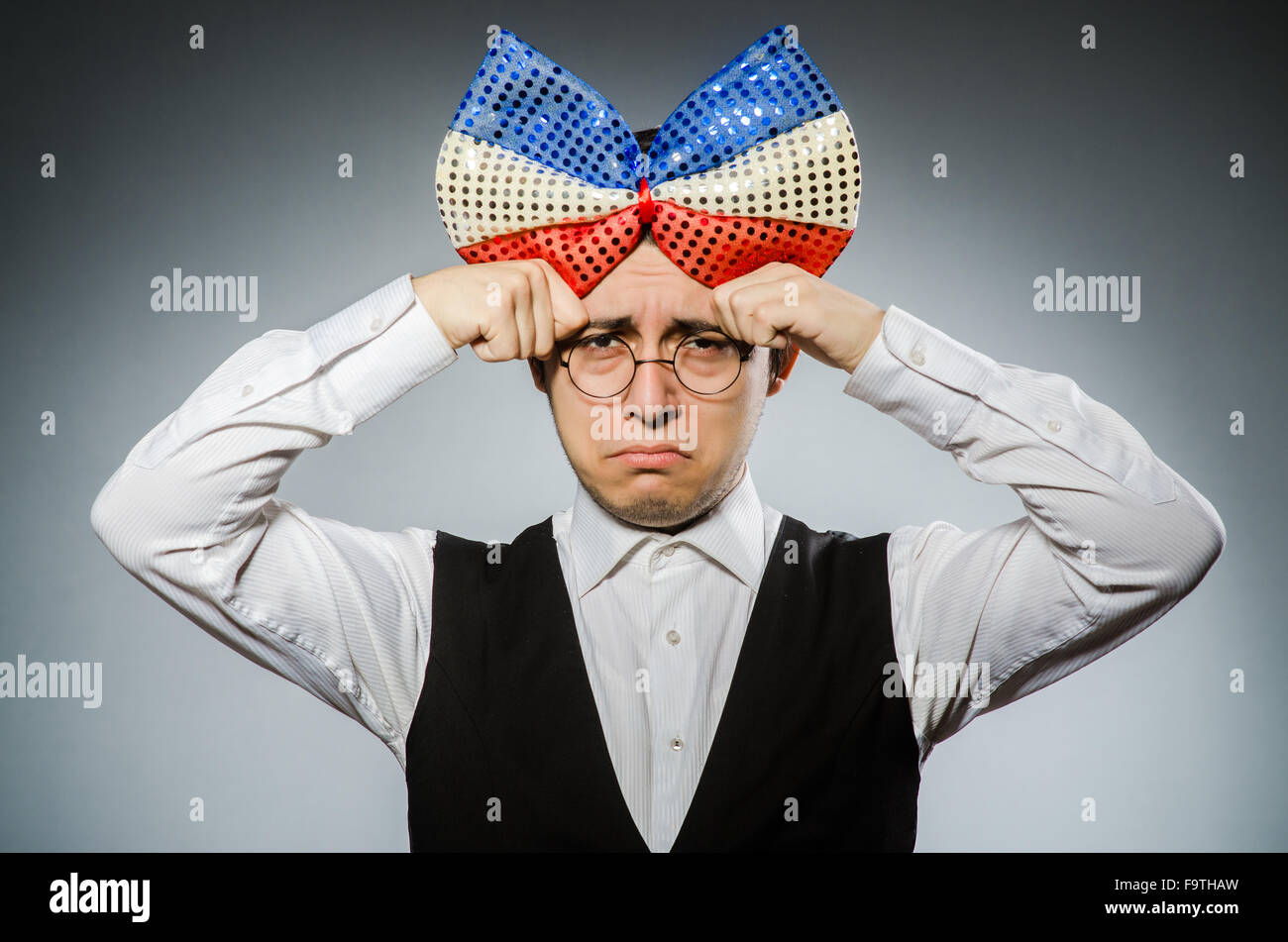 Funny man with giant bow tie Stock Photo Alamy