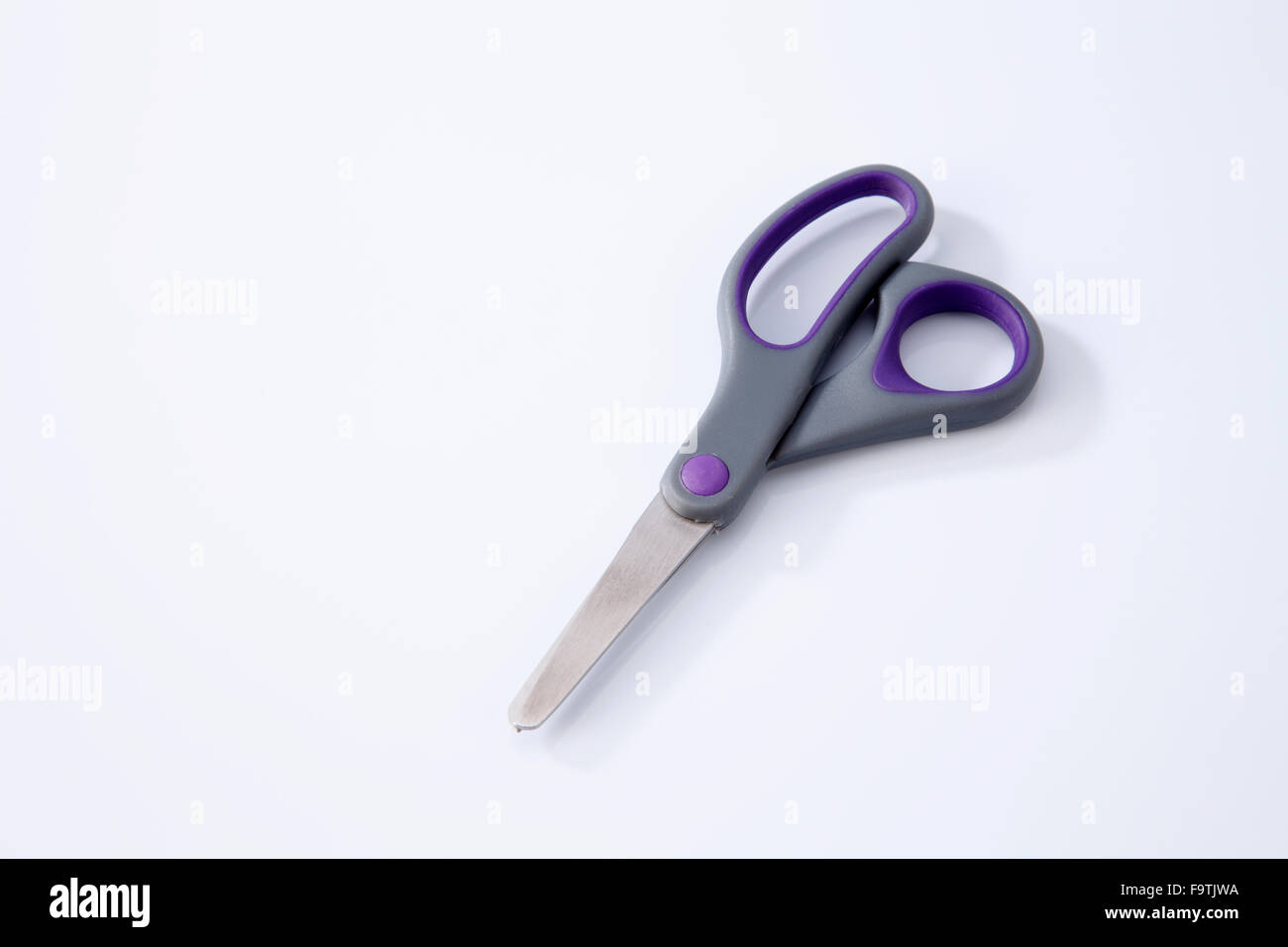 pair of scissors on the white background Stock Photo - Alamy