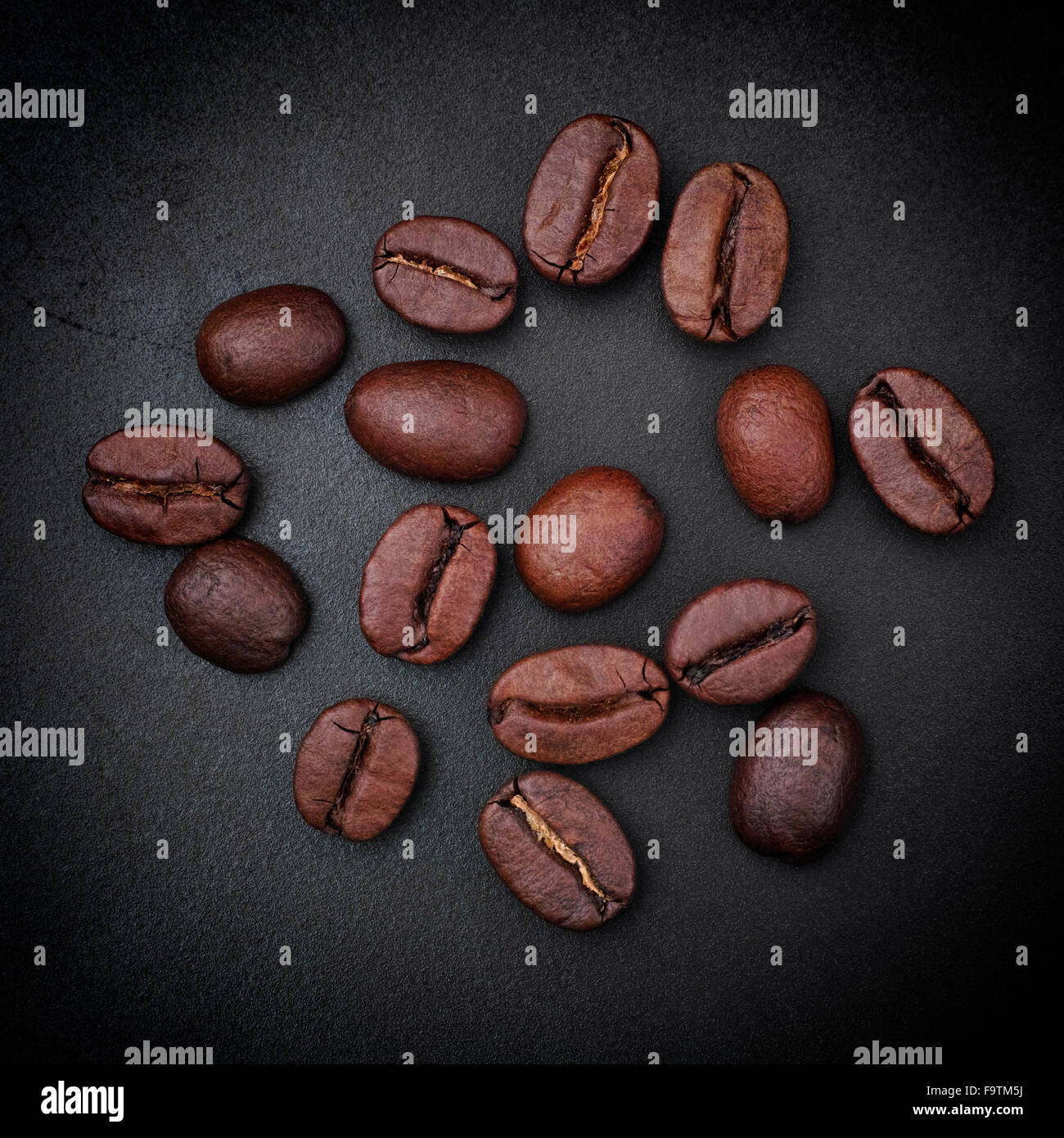 Aromatic coffee beans. Closeup. Vignette Stock Photo - Alamy