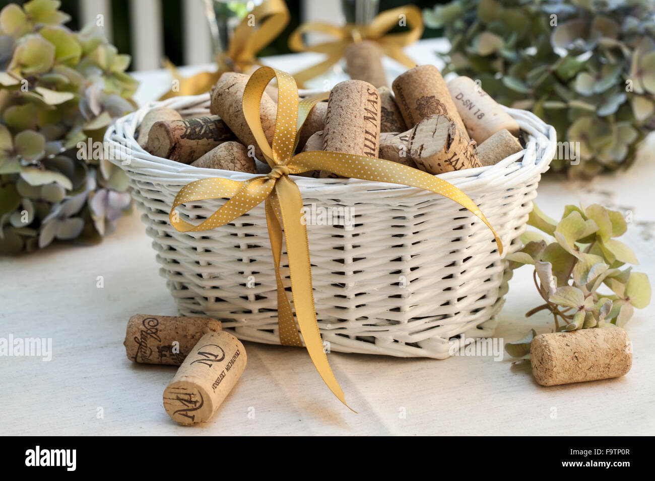 Material: wicker basket, cork, ribbon. Procedure: Pour a cork ko wicker  basket. Tie a ribbon on the basket Stock Photo - Alamy