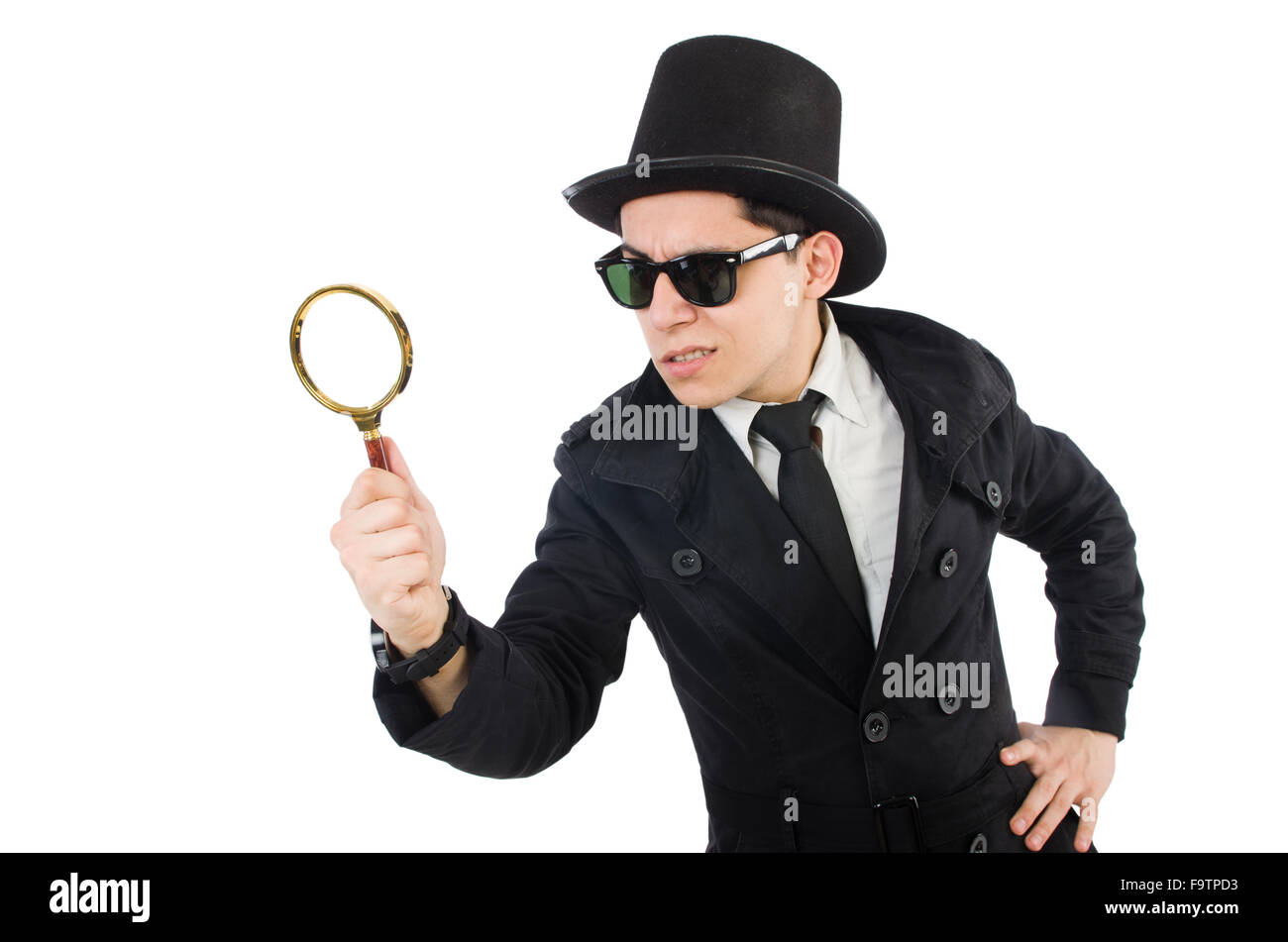 young-detective-in-black-coat-holding-magnifying-glass-isolated-on-F9TPD3.jpg