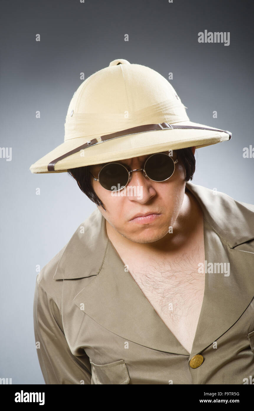 Man wearing safari hat in funny concept Stock Photo - Alamy