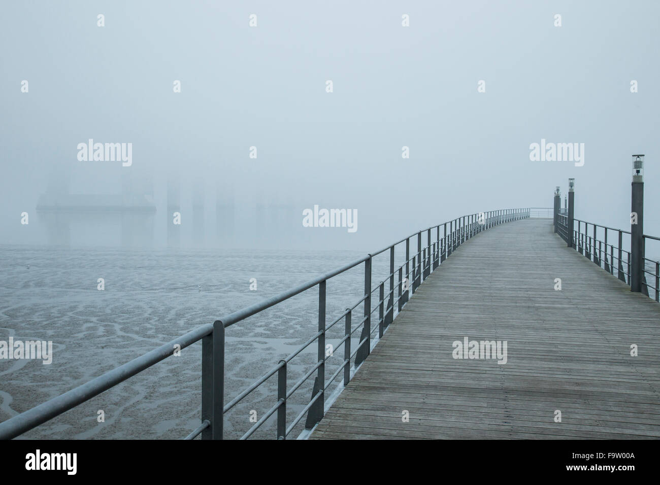 Foggy day in Tejo Park on Lisbon waterfront, Portugal. Stock Photo