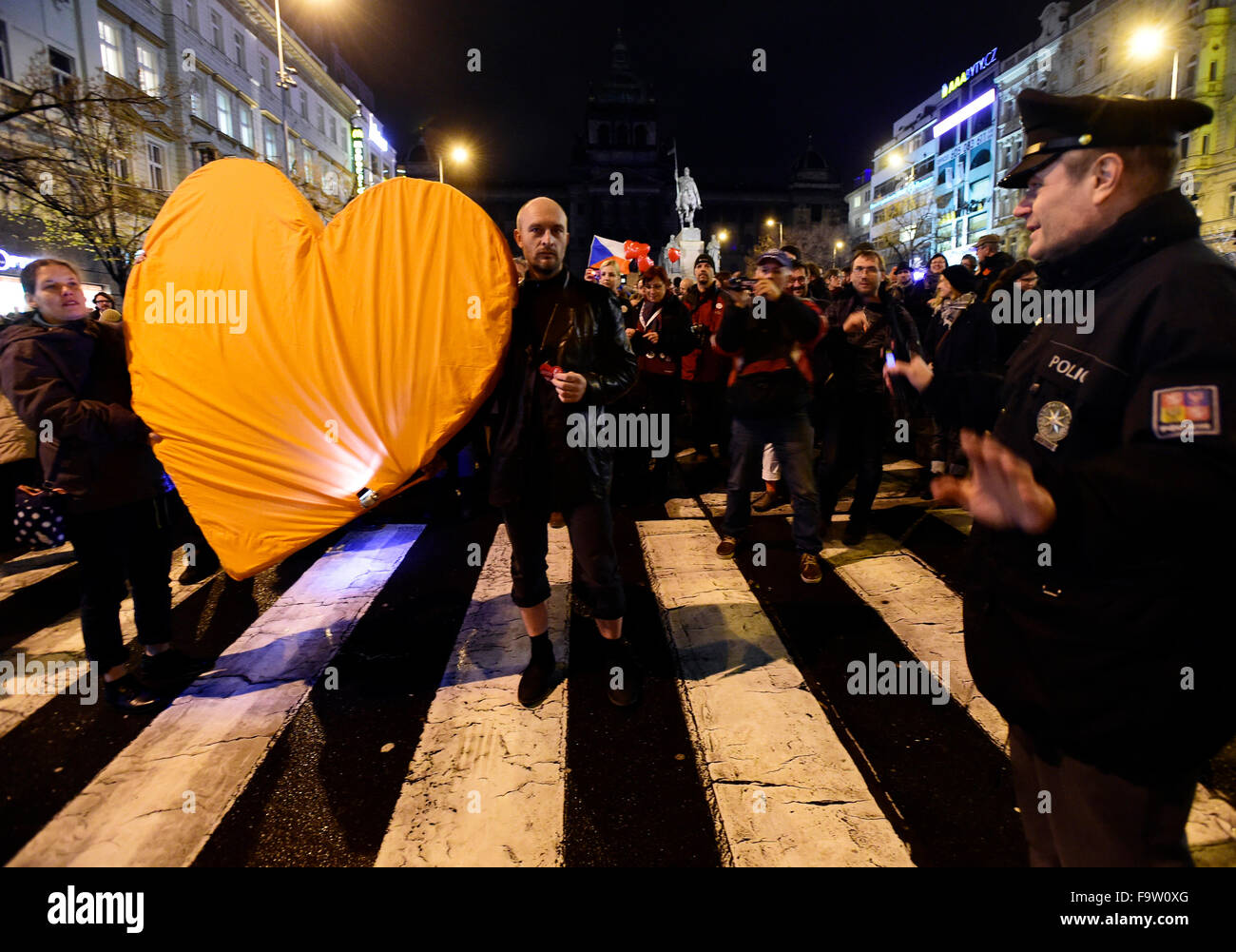 Prague, Czech Republic. 18th Dec, 2015. People hold heart during the commemorative march marking fourth anniversary of death of former president Vaclav Havel (1936-2011) entitled Heart to the Castle - Havel Forever from Wenceslas Square to Hradcany Square in Prague, Czech Republic, December 18, 2015. Credit:  Roman Vondrous/CTK Photo/Alamy Live News Stock Photo