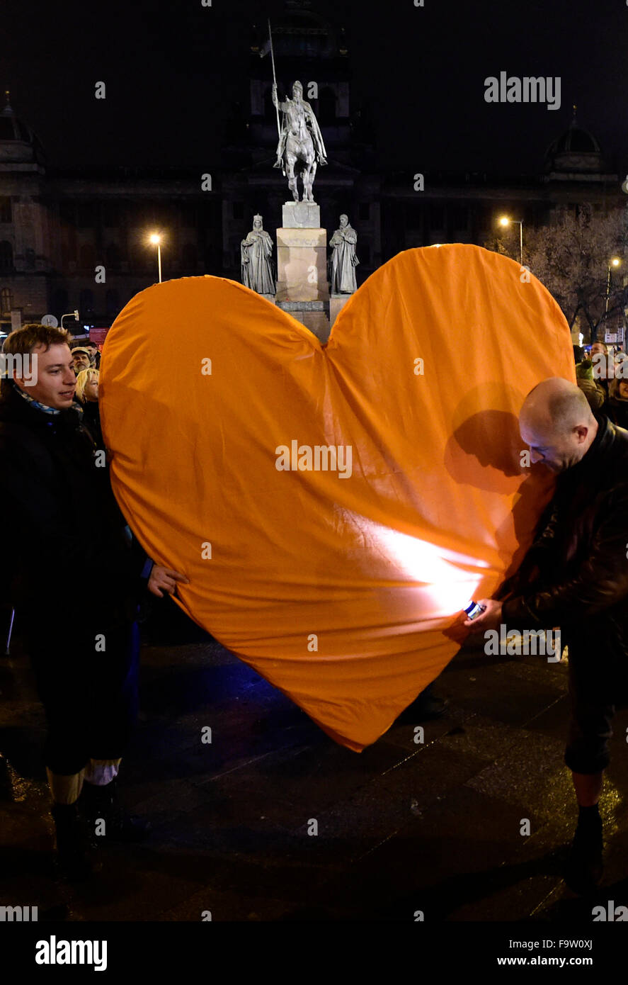 Prague, Czech Republic. 18th Dec, 2015. People hold heart during the commemorative march marking fourth anniversary of death of former president Vaclav Havel (1936-2011) entitled Heart to the Castle - Havel Forever from Wenceslas Square to Hradcany Square in Prague, Czech Republic, December 18, 2015. Credit:  Roman Vondrous/CTK Photo/Alamy Live News Stock Photo