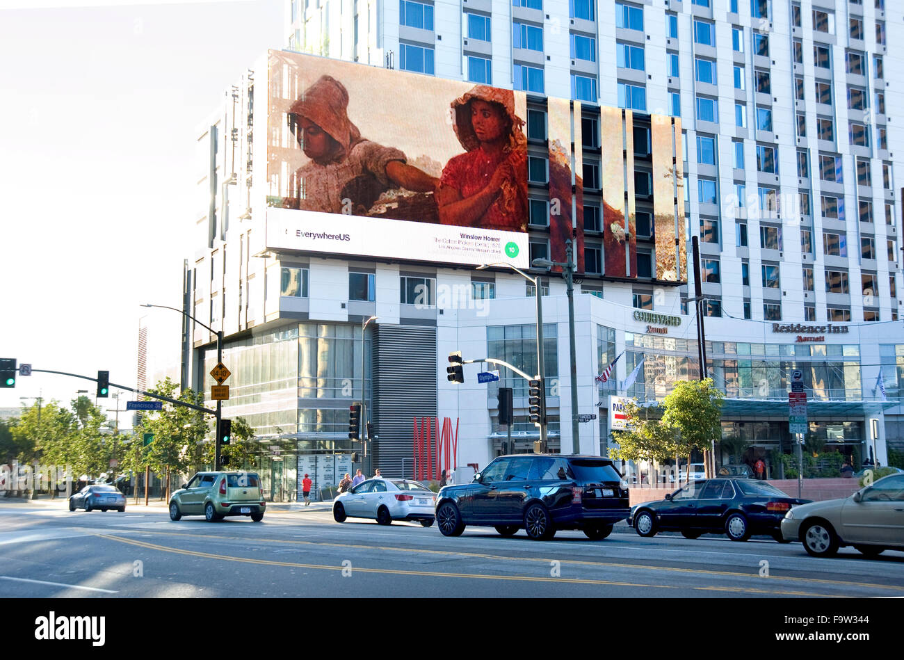 A Winslow Homer fine art painting appears on a digital billboard in