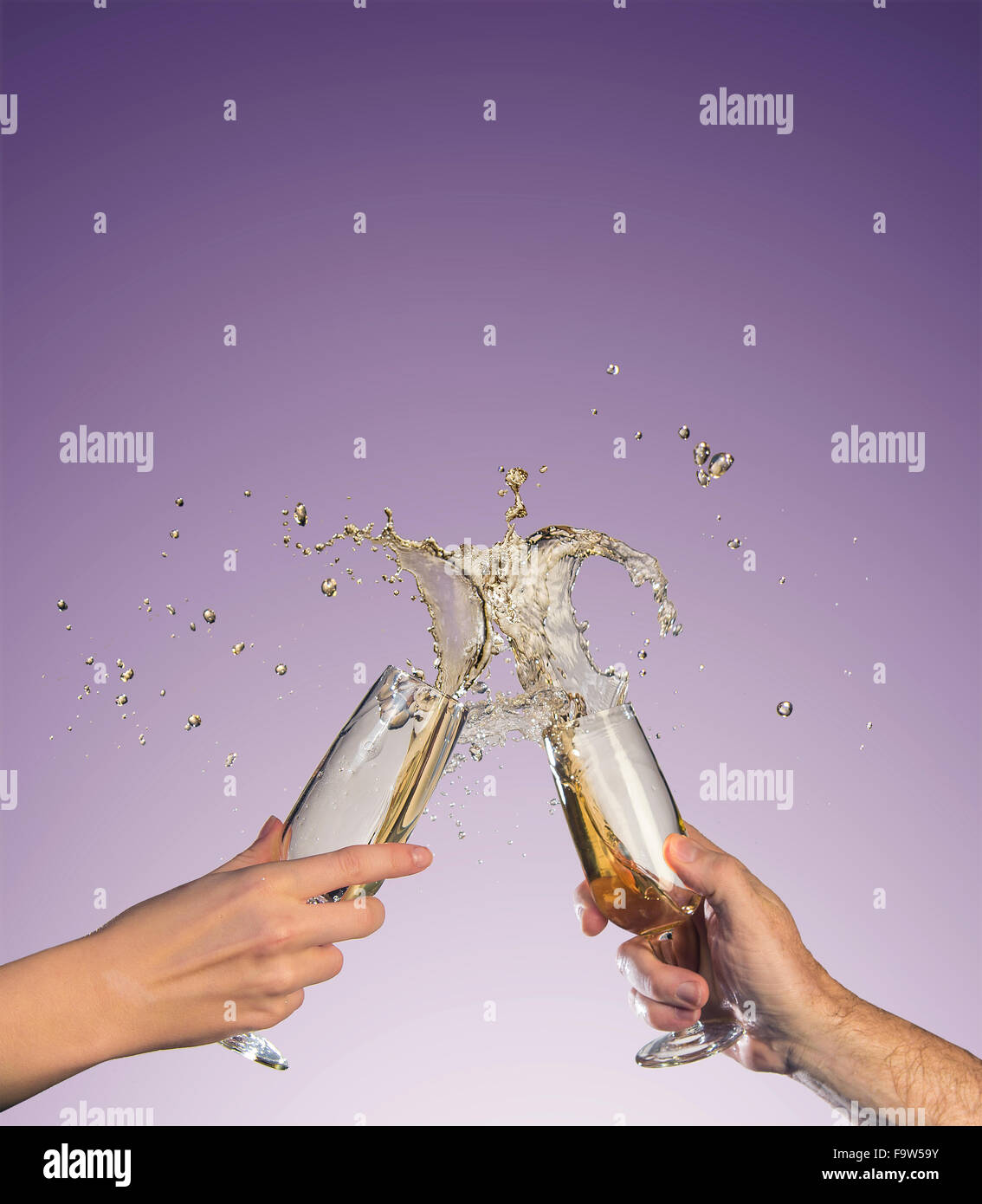 Champagne Toast With Splash Stock Photo