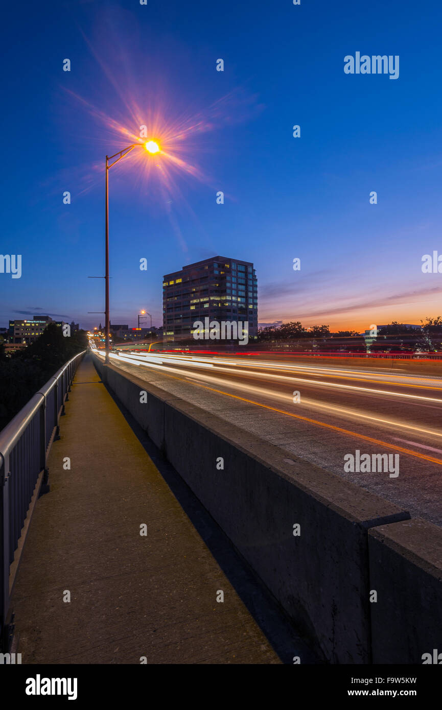 Highway Bridge At Dusk With Lamp Post and Building, Philadelphia, USA Stock Photo
