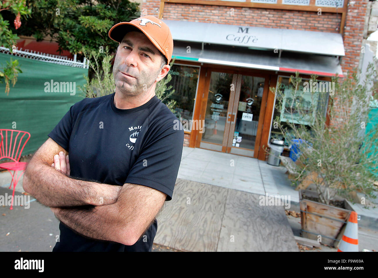 Napa, CA, USA. 18th Dec, 2015. Rick Molinari, seen outside his Brown Street business, Molinari Caffe, estimates his losses due to the August 2014 earthquake to be about $100,000. He is hopeful that he can remain in business while neighboring buildings undergo repairs. © Napa Valley Register/ZUMA Wire/Alamy Live News Stock Photo