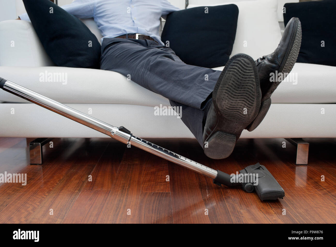 Man feet up sofa hires stock photography and images Alamy