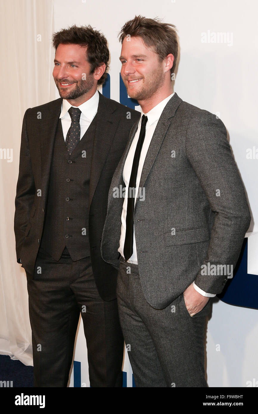 Actors Bradley Cooper (L) and Jake McDorman attend the 'Joy' premiere at the Ziegfeld Theatre on December 13, 2015. Stock Photo