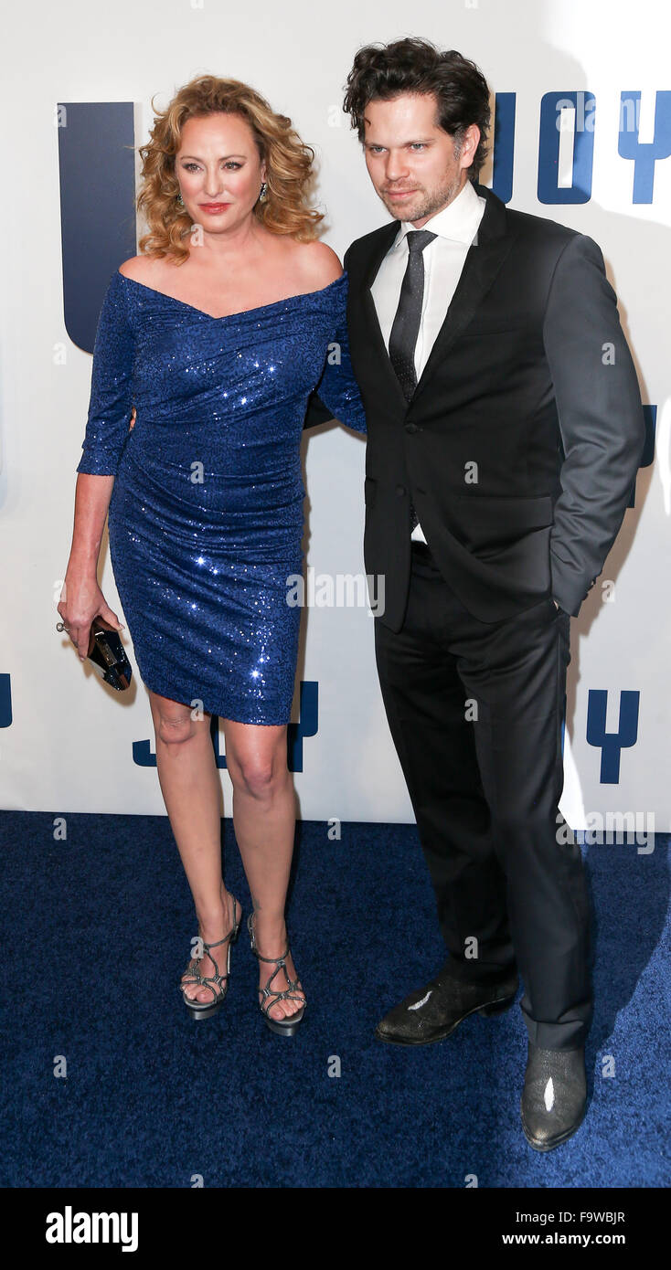 Actress Virginia Madsen (L) and son Jack Sabato attend the 'Joy' premiere at the Ziegfeld Theatre on December 13, 2015. Stock Photo