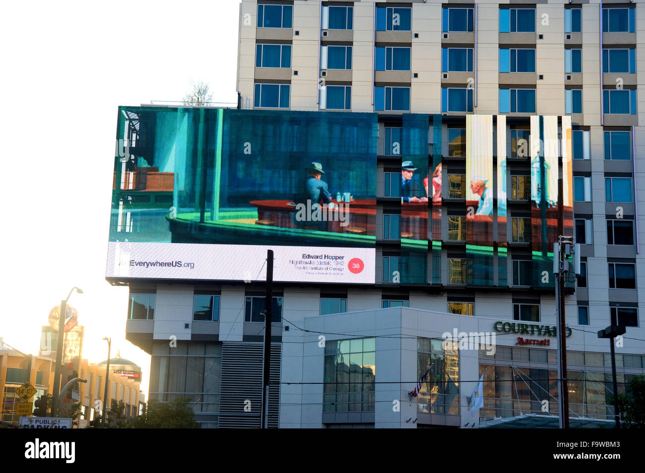 An Edward Hopper painting appears on a digital billboard in Downtown Los Angeles during the Art Everywhere event. Stock Photo