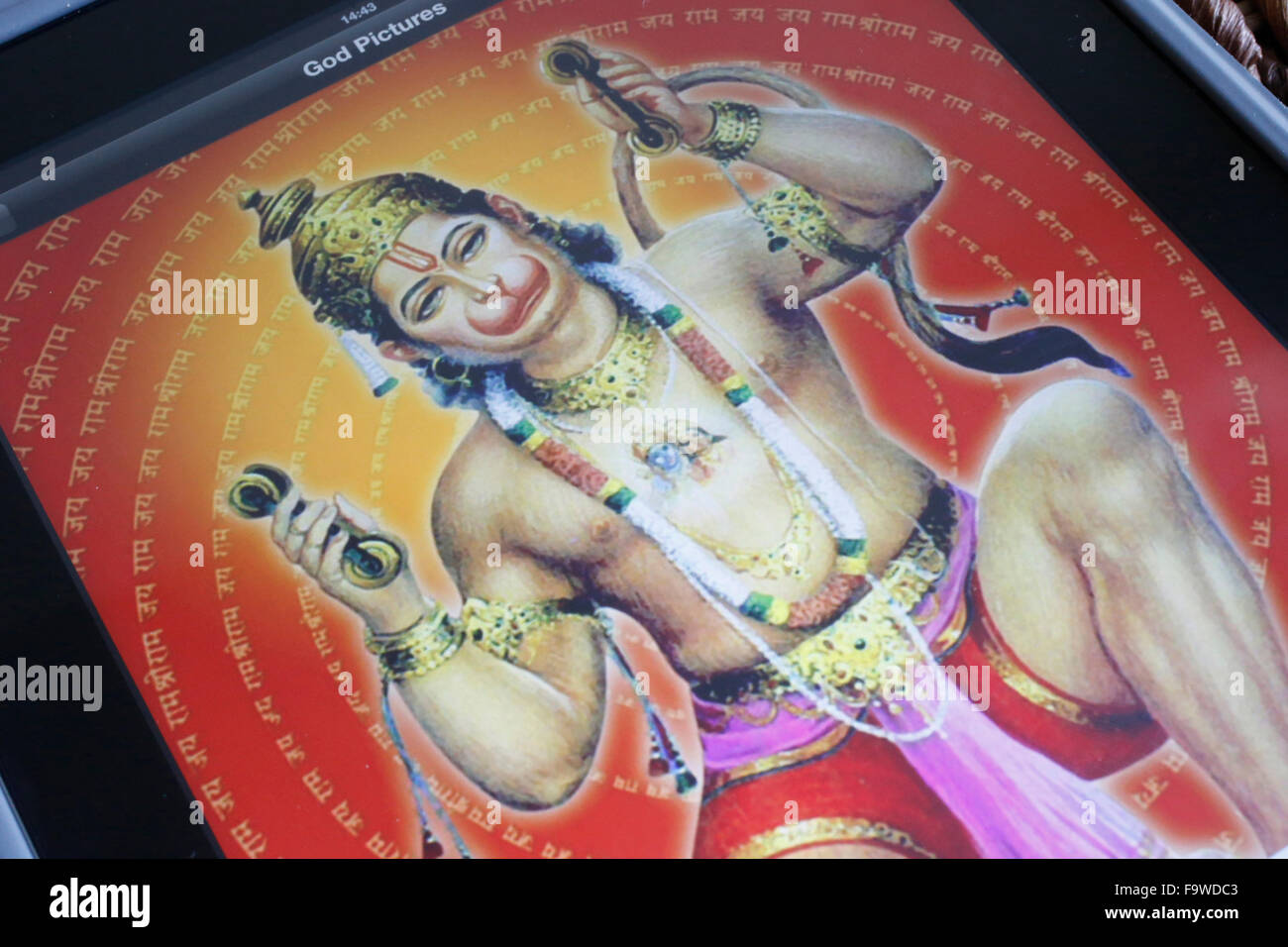 Hindu deity on an Ipad. Hanuman. Stock Photo