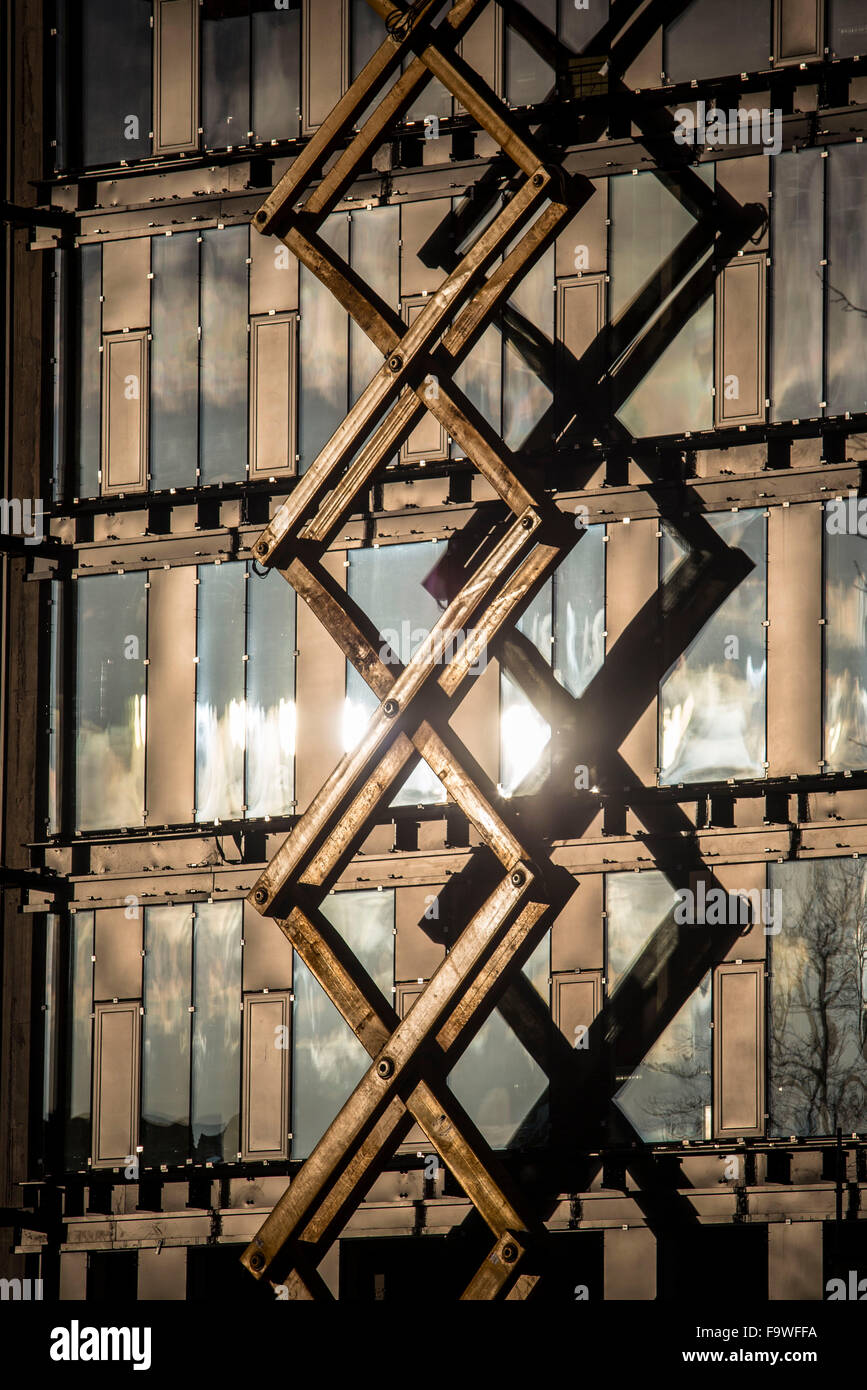 A scissor lift working outside a new building on the University of ...
