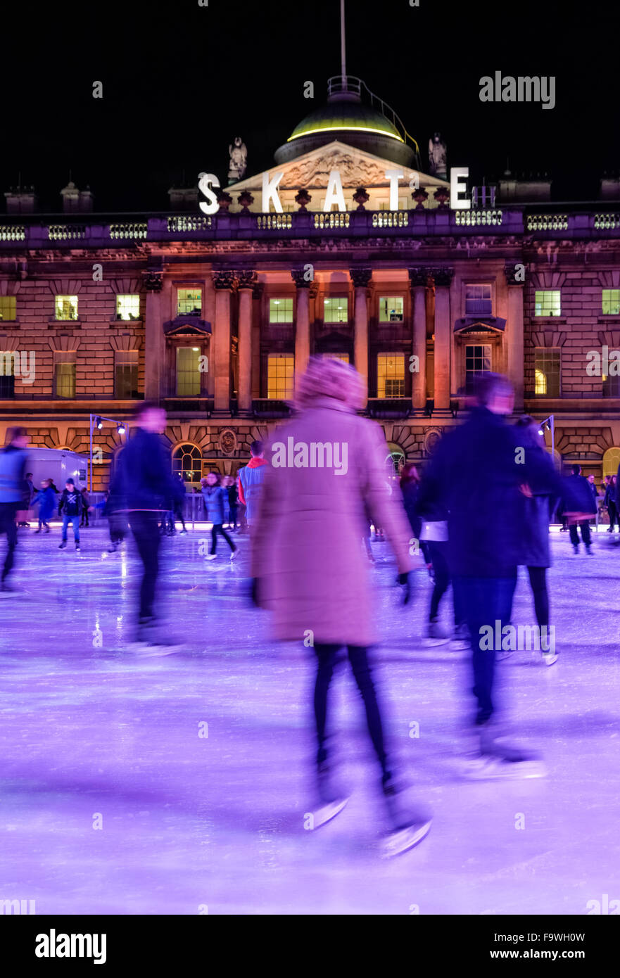 People ice skating at Somerset House Ice Rink, London England United
