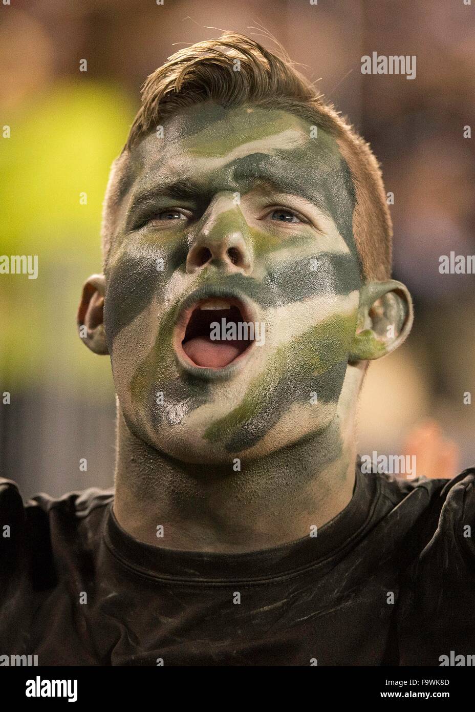 A West Point Army cadet wearing face paint cheers for the Army Black Knights during the traditional NCAA football rivalry between the Army Black Knights and the Navy Midshipmen played at Lincoln Financial Field December 12, 2015 in Philadelphia, PA. Stock Photo