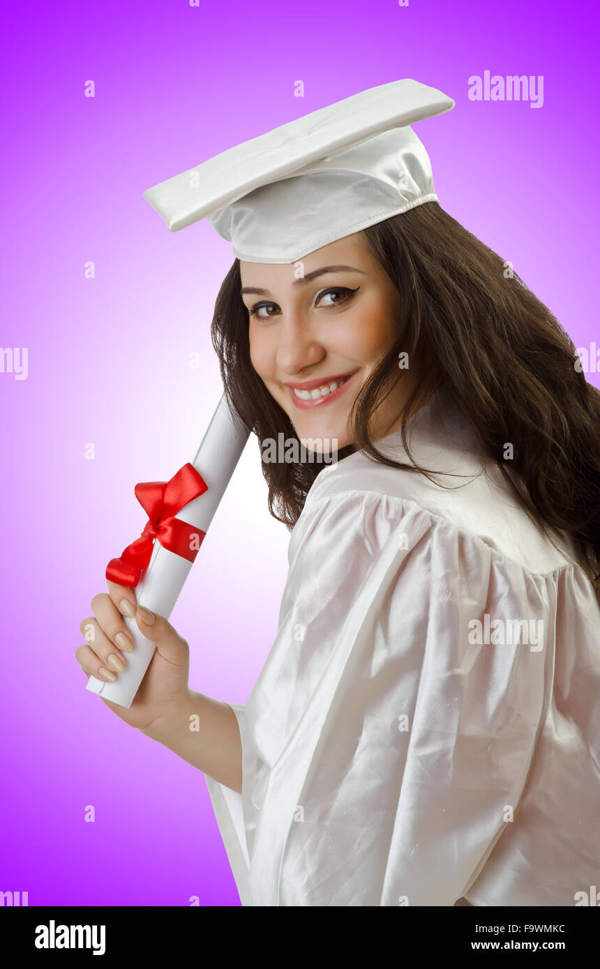 Happy student celebrating graduation on white Stock Photo - Alamy