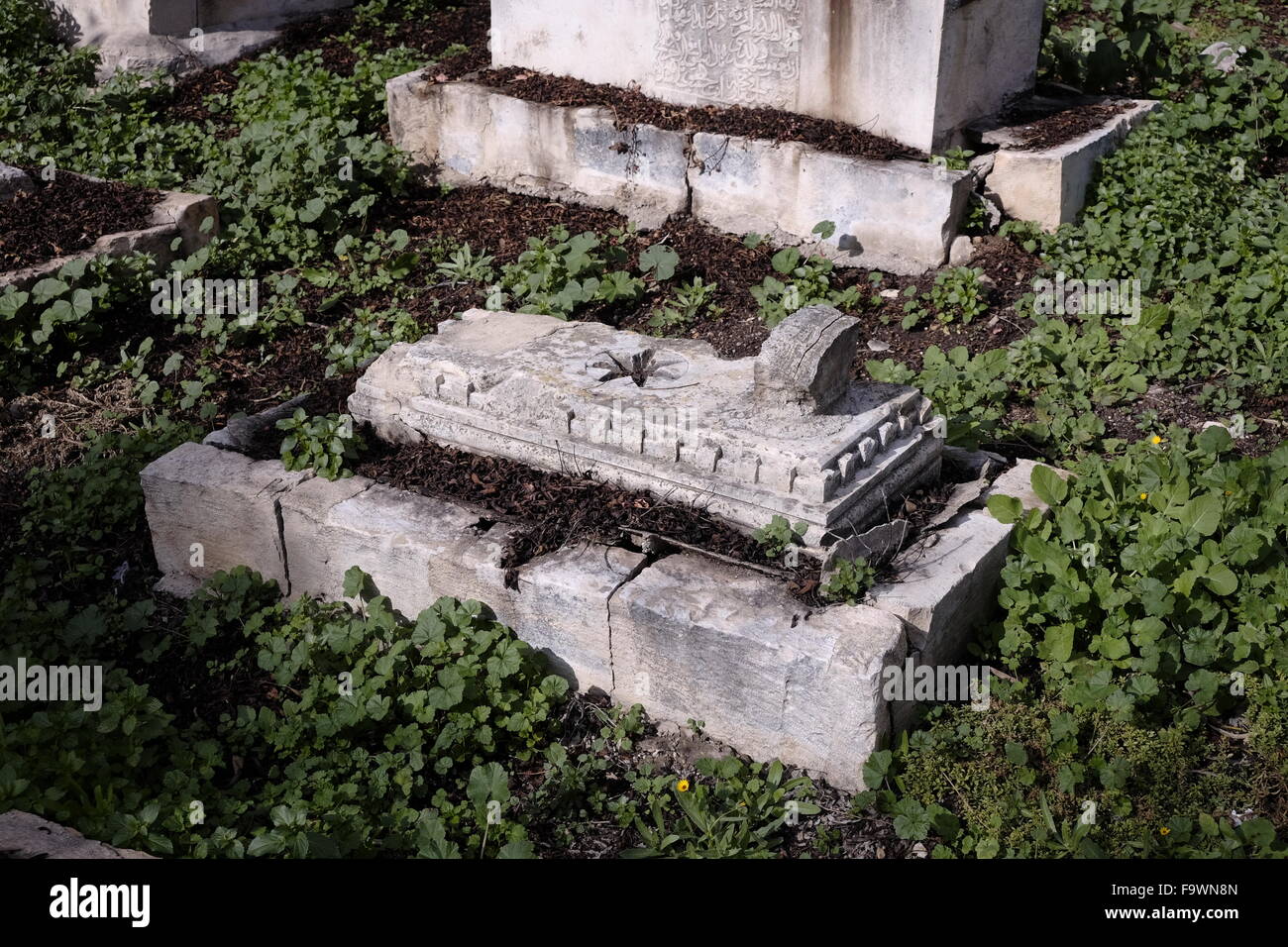 Old tombstones at the Mamilla Cemetery a historic Muslim cemetery located in the center of west Jerusalem Israel. The cemetery contains the remains of figures from the early Islamic period, Sufi shrines and Mamluk era tombs. Stock Photo