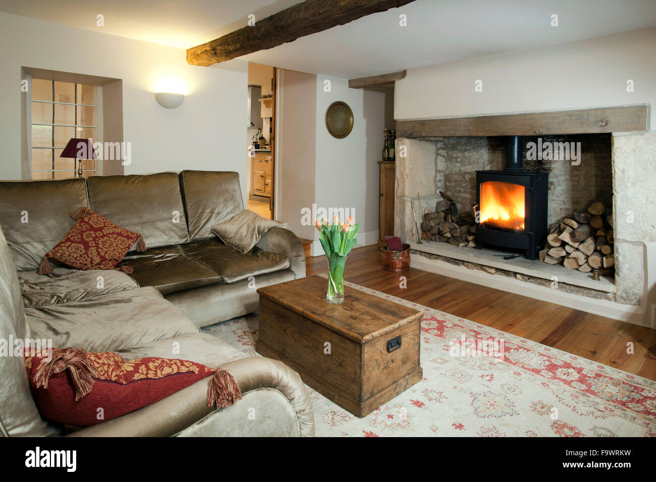 Cottage sitting room with a log burning stove. Stock Photo