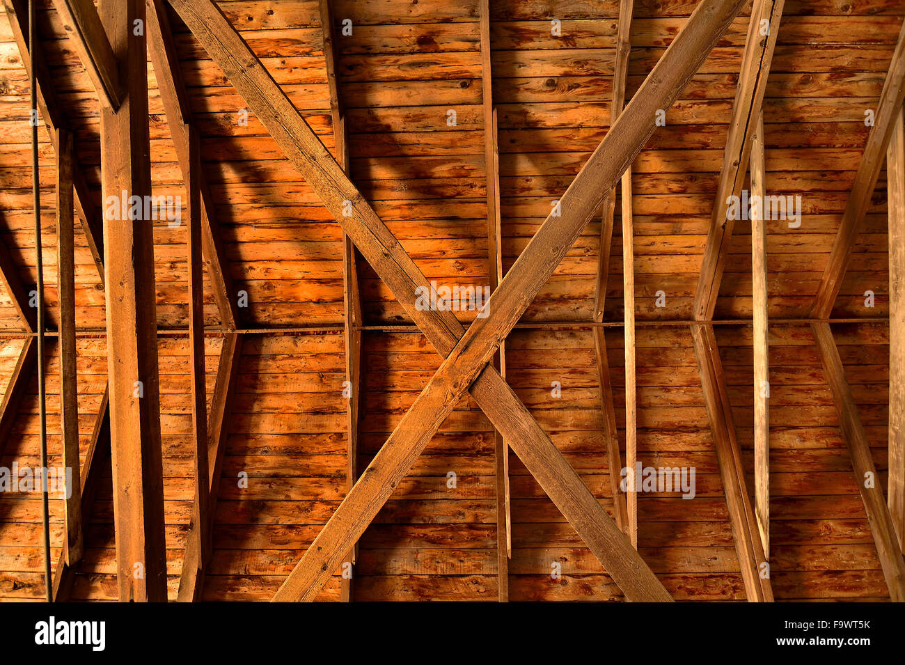 Looking up at the interior of a roof of a covered bridge in rural Sussex New Brunswick Canada Stock Photo